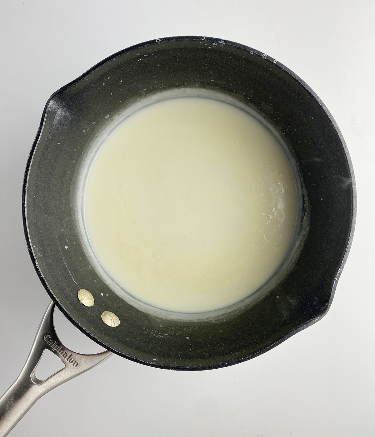 Thickened flour milk and butter mixture in a pot.