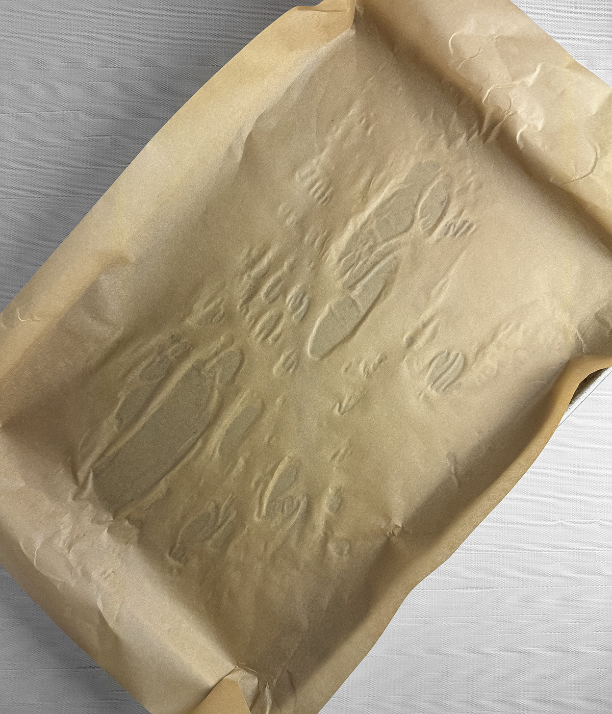 Baking sheet lined with parchment..