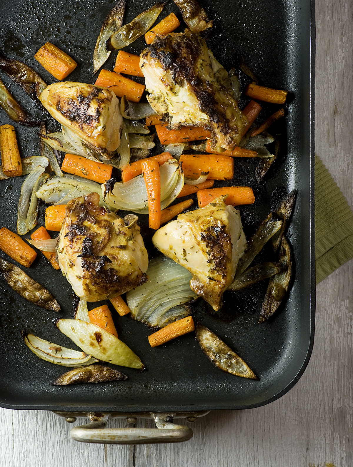 Roasted Dijon Chicken in a roasting pan.