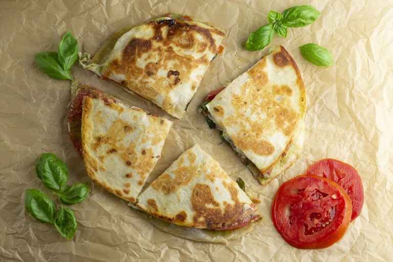 Sliced caprese quesadilla.
