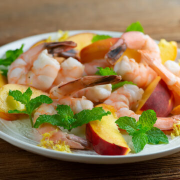 Cool Shrimp and Peach Salad on a plate.