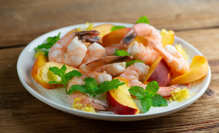 Cool Shrimp and Peach Salad on a plate.
