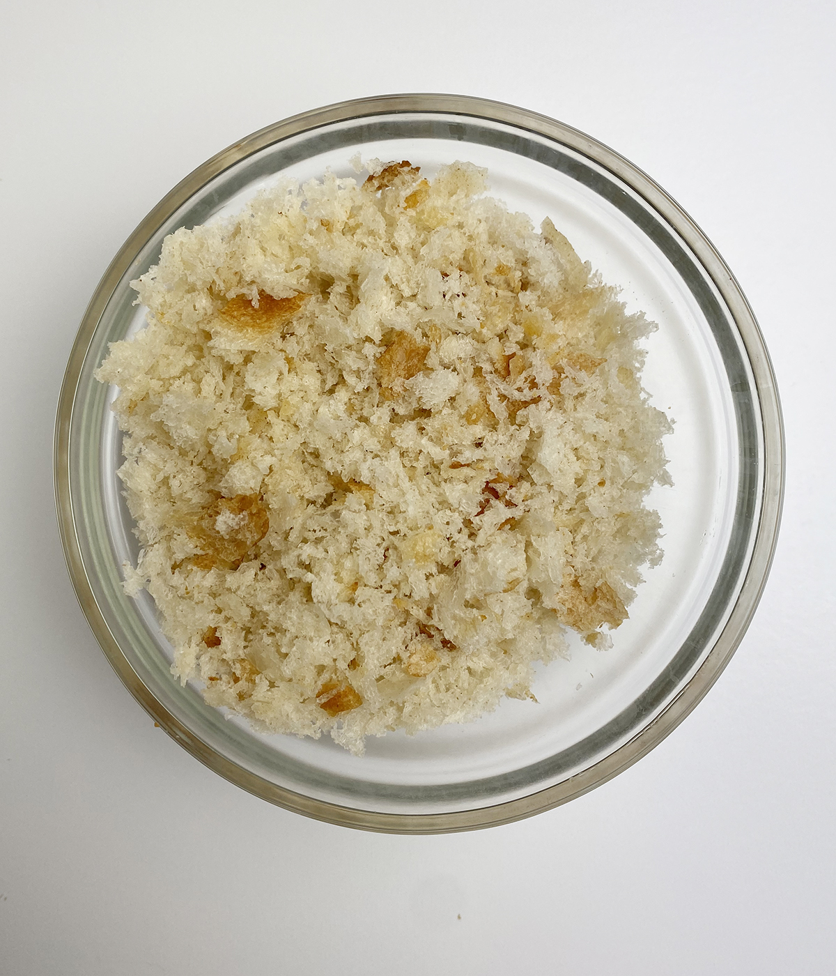 Freshly made breadcrumbs in a bowl.