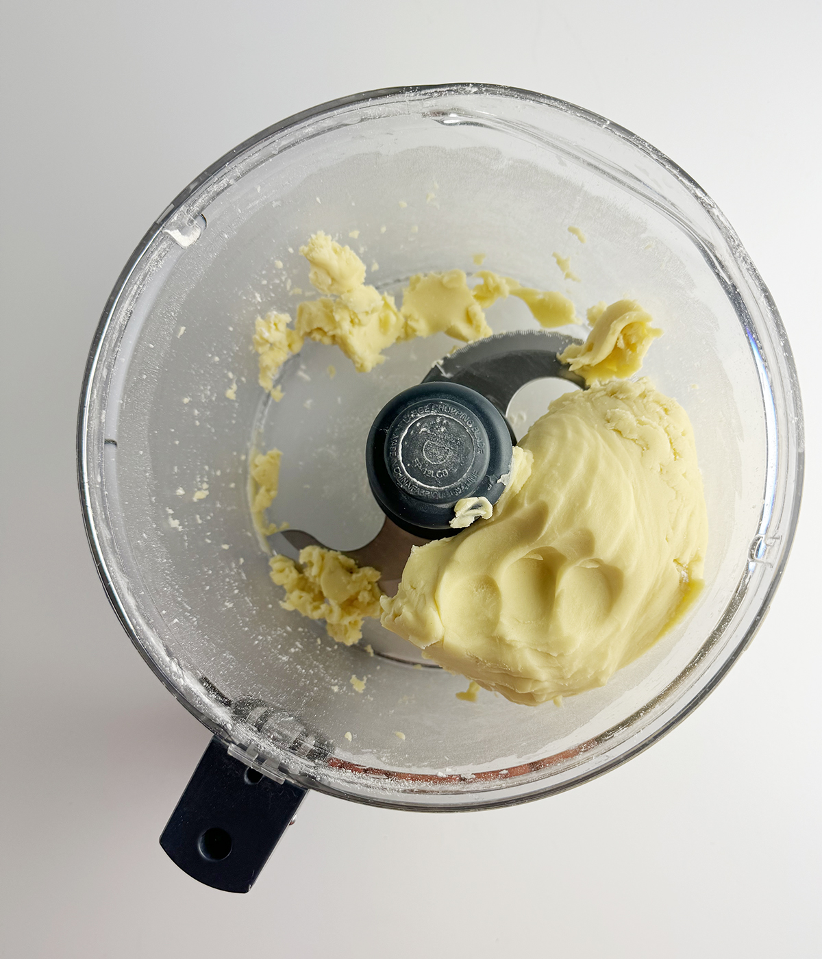 Shortbread batter in a food processor.