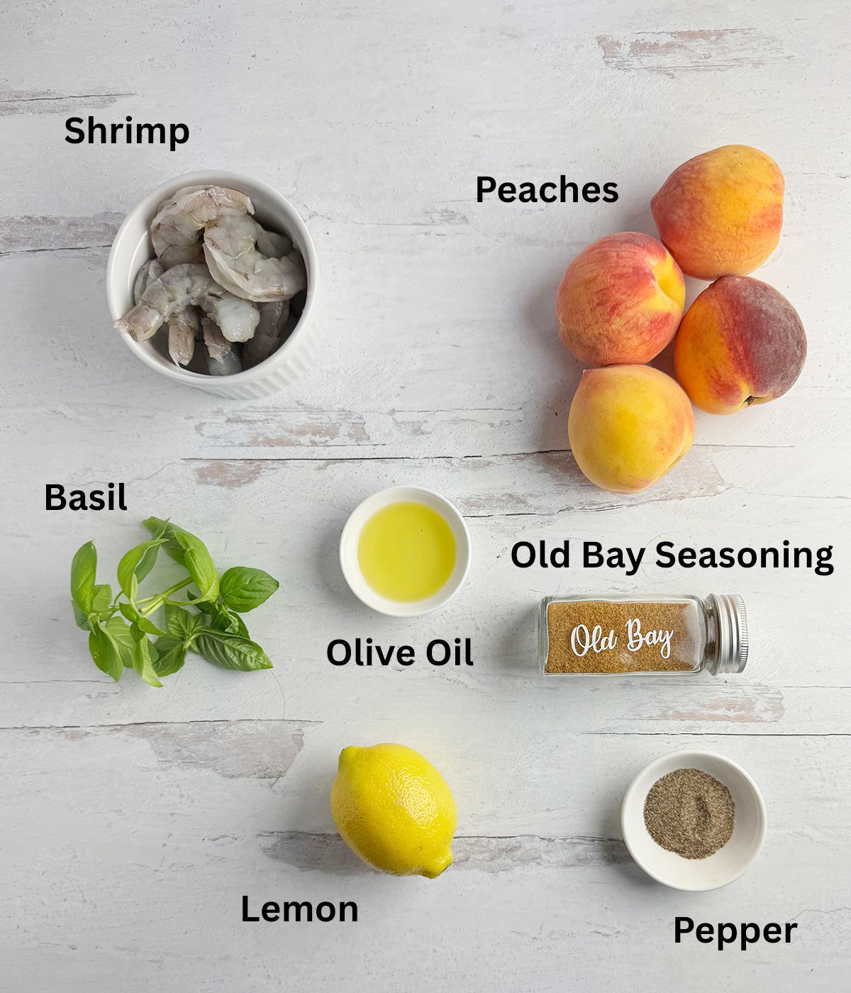 Ingredients needed to make a cool shrimp and peach salad.