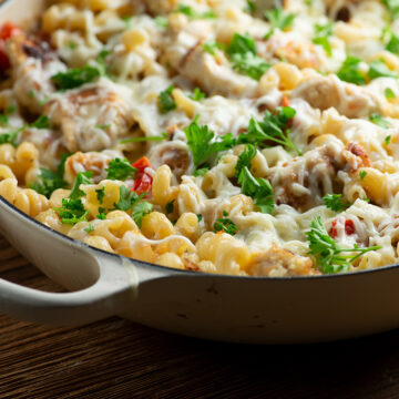 Chicken parmesan pasta in a skillet.