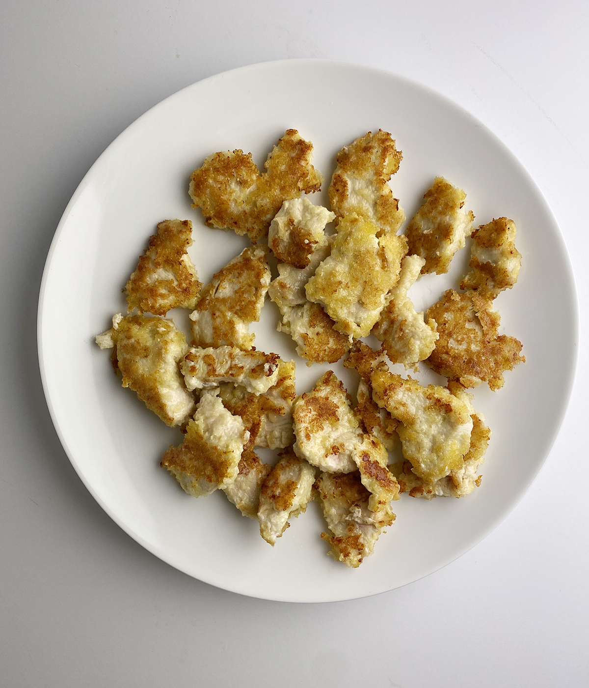 Fried Chicken tenders on a plate.