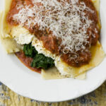 Soup bowl lasagna on a placemat.