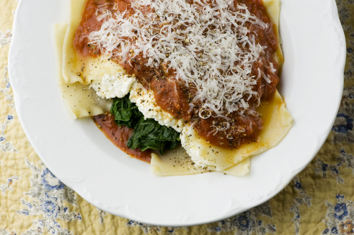 Soup bowl lasagna on a placemat.