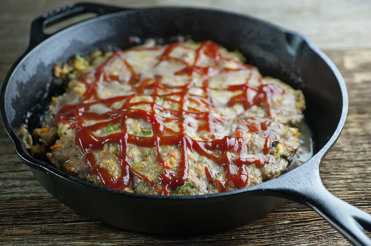 Skillet meatloaf in a cast iron pan.