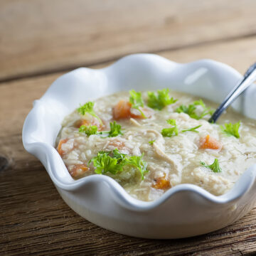 A bowl of slow cooker chicken noodle soup.