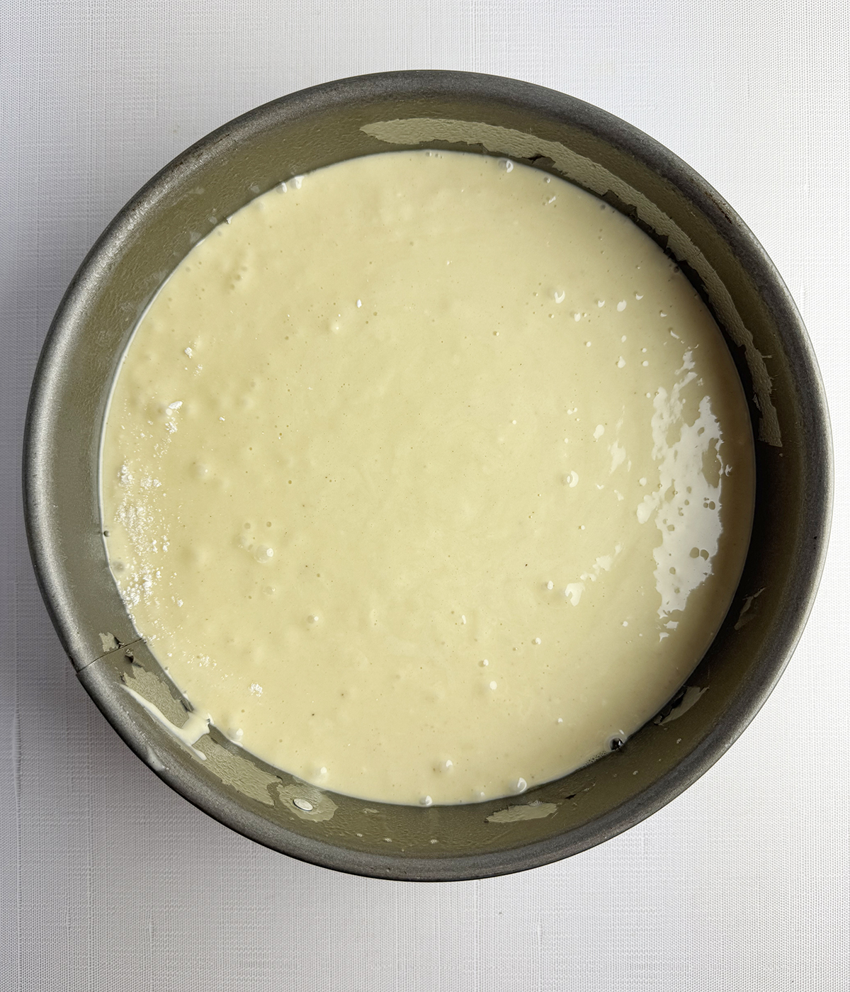 Banana cake batter in a pan.