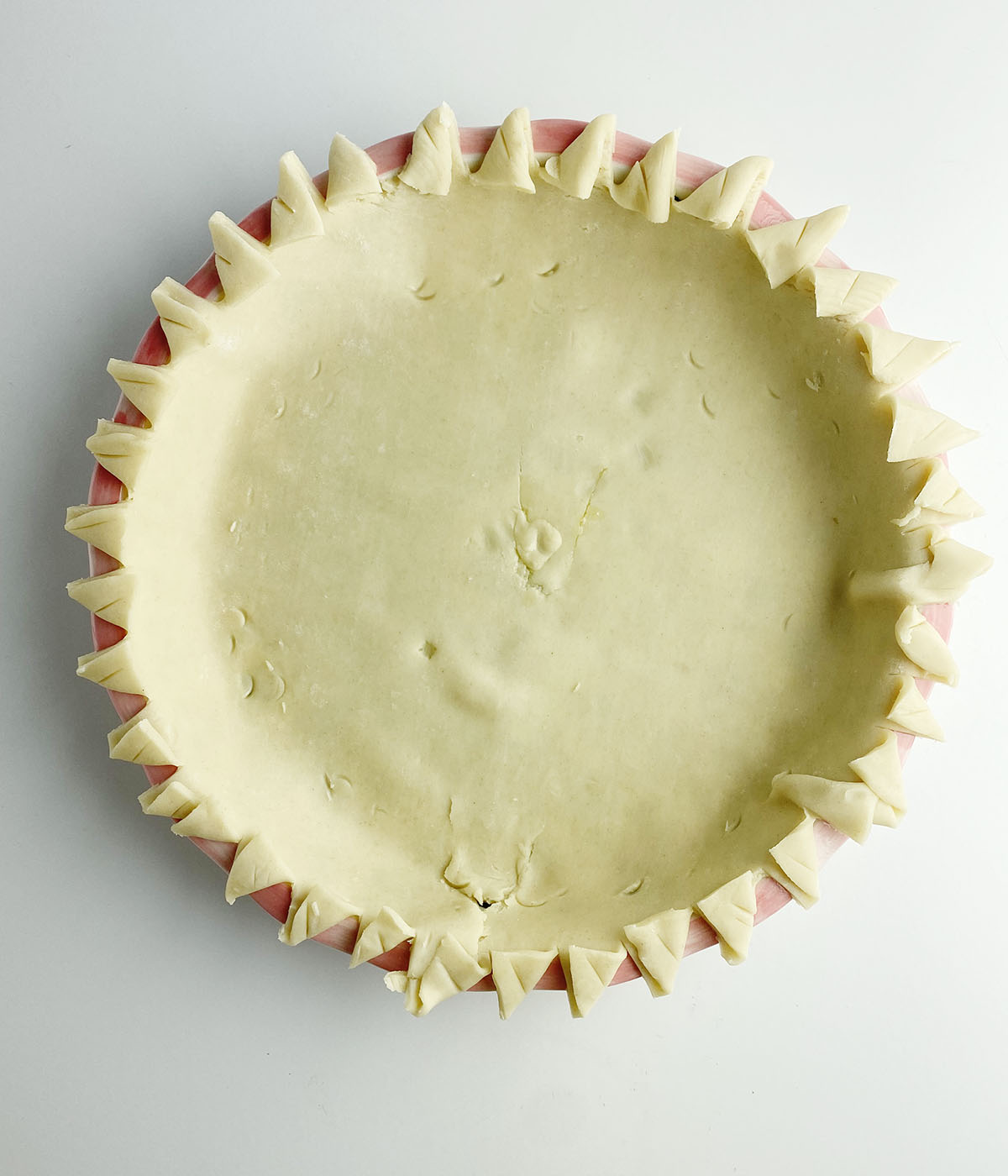 Pie crust in a pie pan.