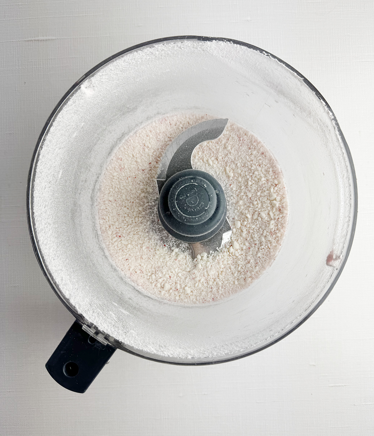 Ground up peppermint candy in a food processor.