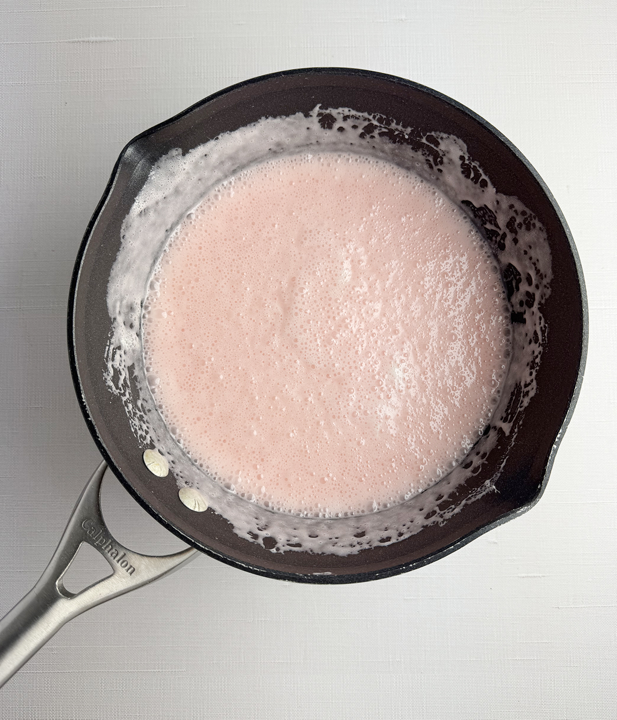 Melted peppermint mixture in a pot.