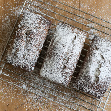 Mini banana gingerbreads with powdered sugar.