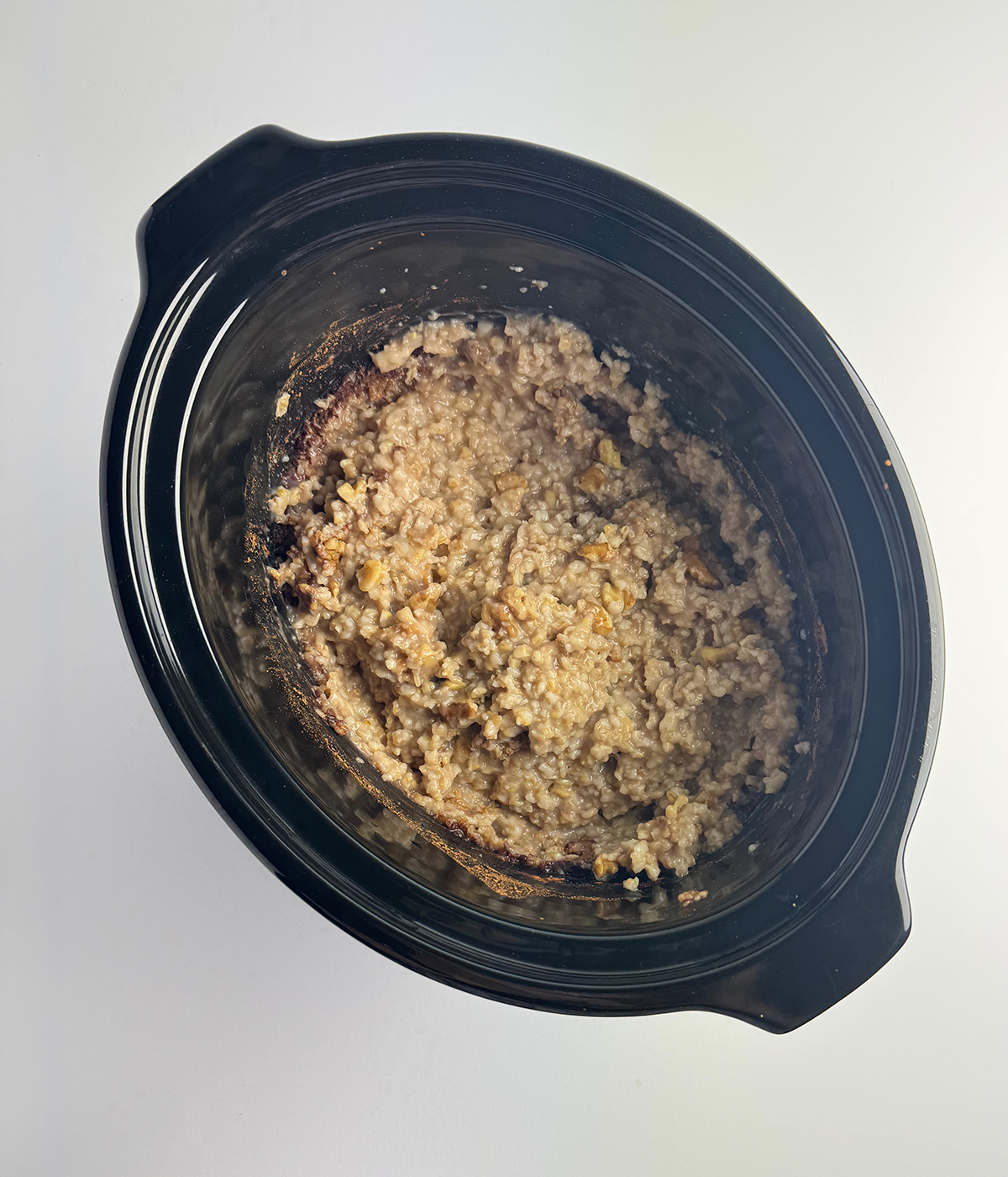 Cooked oatmeal in a slow cooker.