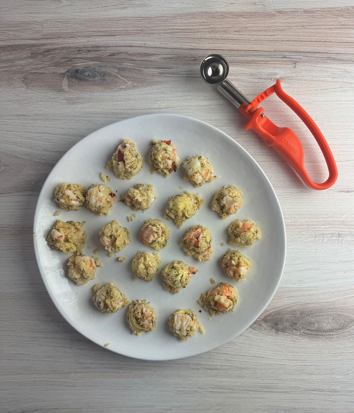 Lobster dumplings on a cutting board.