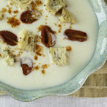Cheddar cheese soup in a bowl.