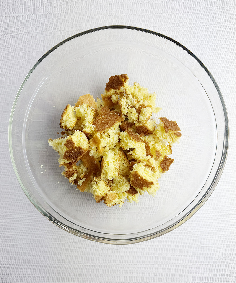 Crumbled cornbread in a bowl.
