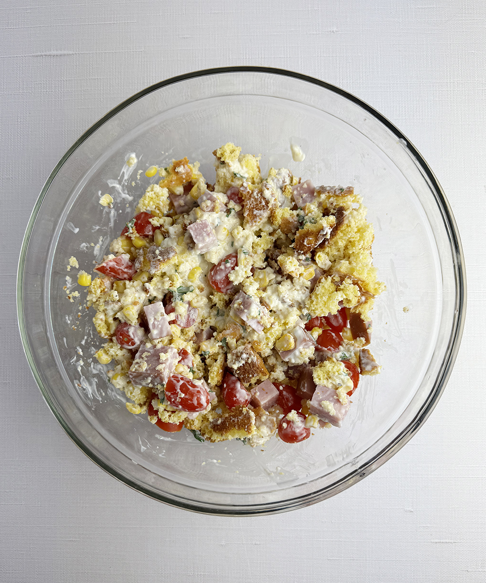 Ham cornbread salad in a bowl.