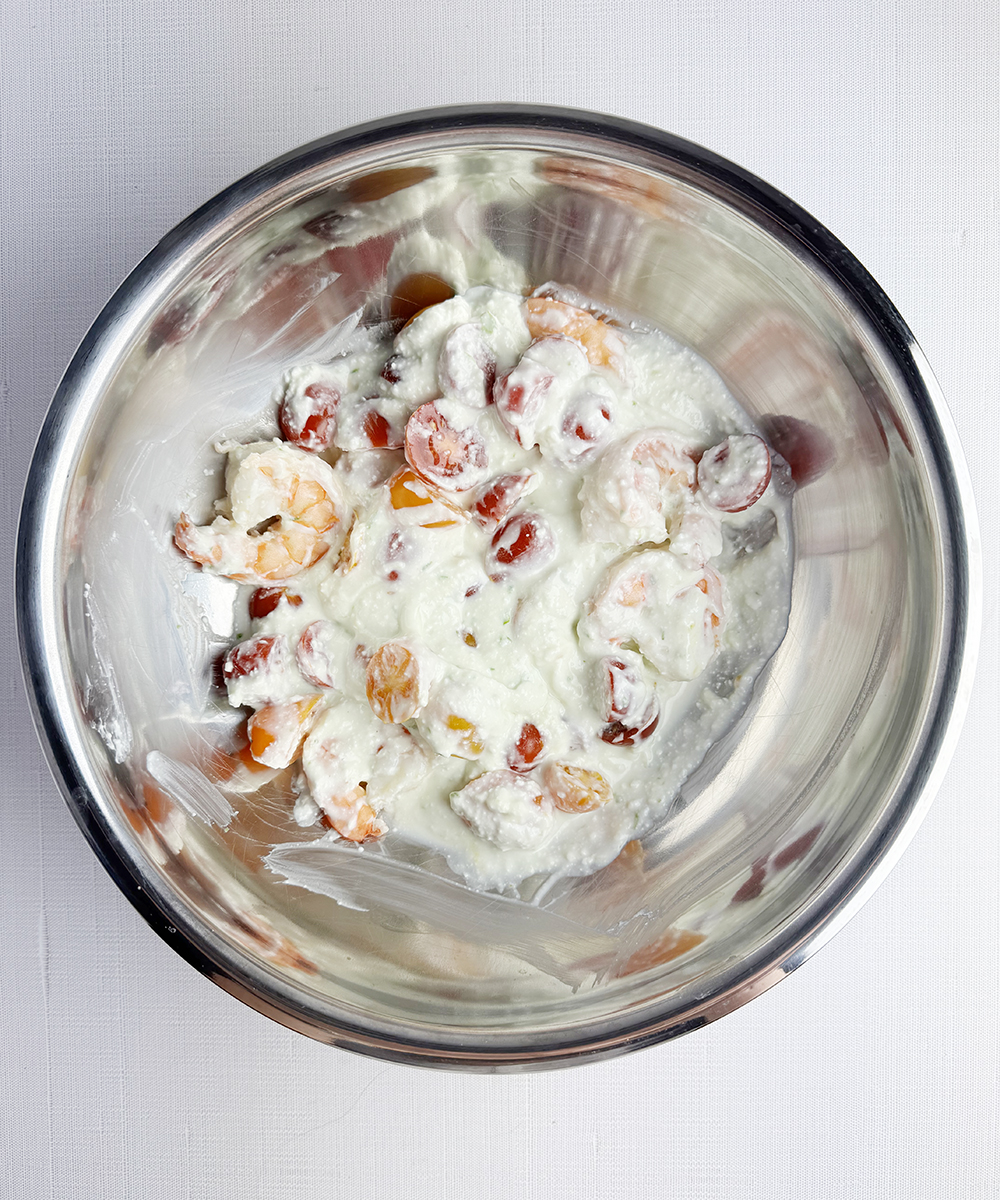 Shrimp and feta sauce in a bowl.