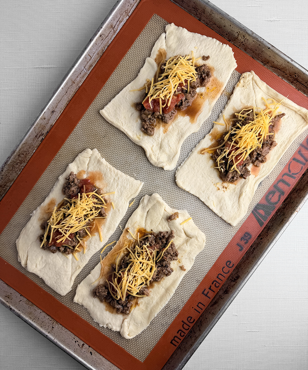 Crescent roll dough with burrito filling.