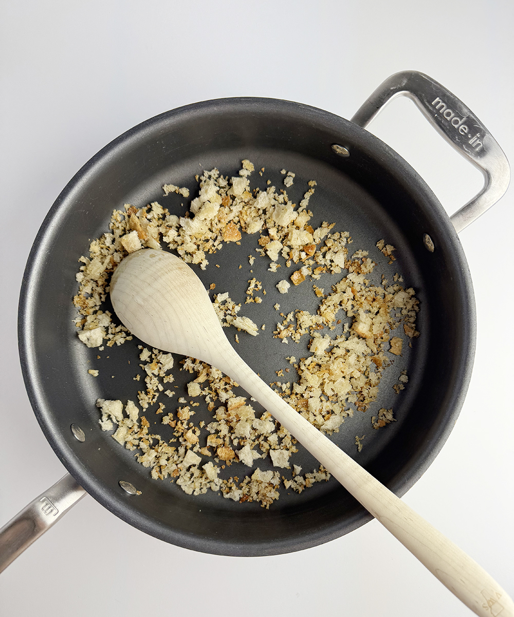Toasted bread crumbs in a skillet.