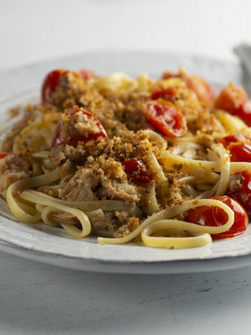 Tuna pasta on a plate with a fork.