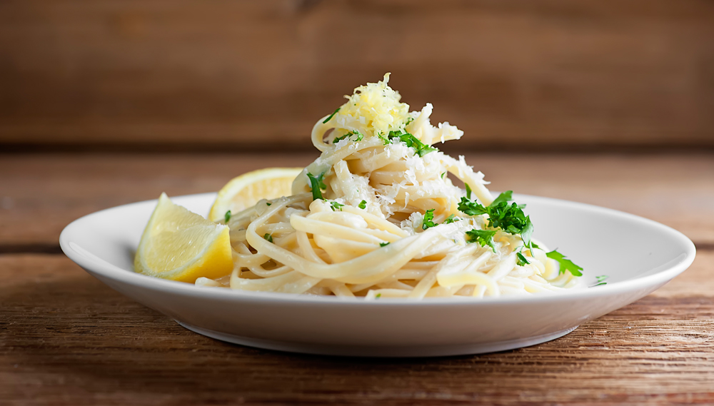 Plate of creamy lemon pasta.