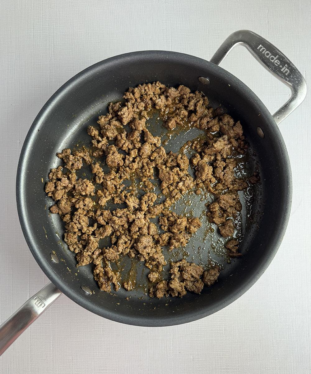 Taco meat in a skillet.